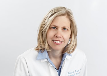 a person in a white lab coat