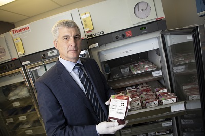 Dr. Dean Fergusson holds a bag of blood in The Ottawa Hospital's Blood Bank