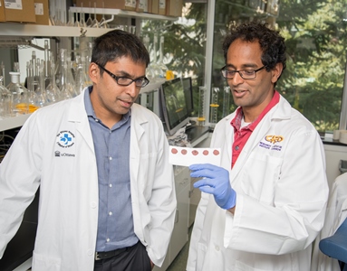  Dr. Kumanan Wilson and Dr. Pranesh Chakraborty. Photo credit CHEO. 