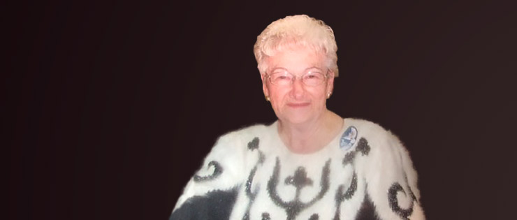 a person in a white and black sweater