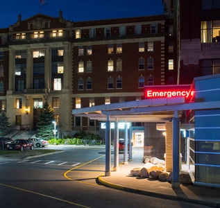 a building with a sign that says emergency