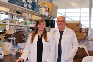 two people standing in a lab