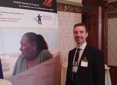 a person standing next to a poster