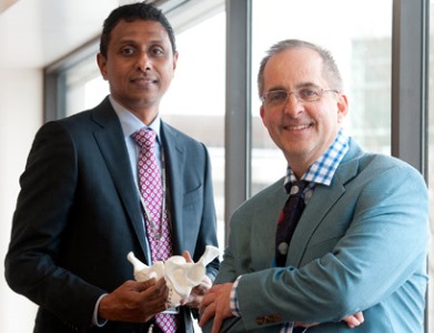 two people in suits and ties