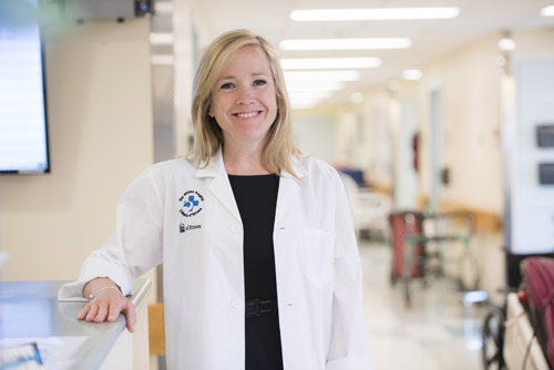 two people in lab coats