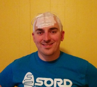 a person with a bandage on their head